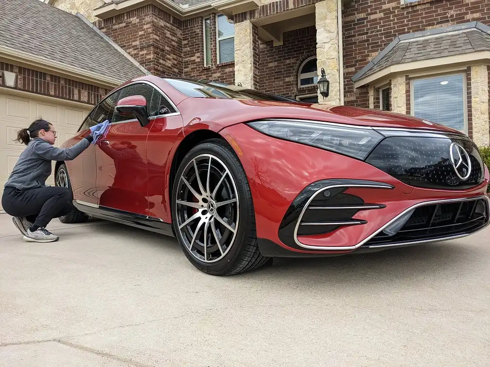 Britinee buffing out car wax after a hand car wash and wax in mansfield texas
